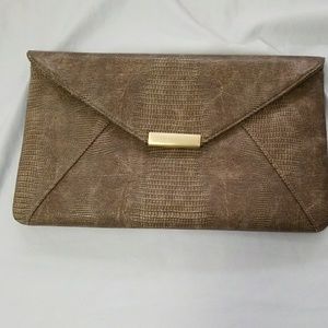 Snake skin pattern clutch